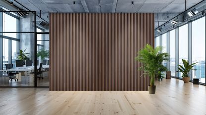 Modern office space with a wooden wall panel and large windows.